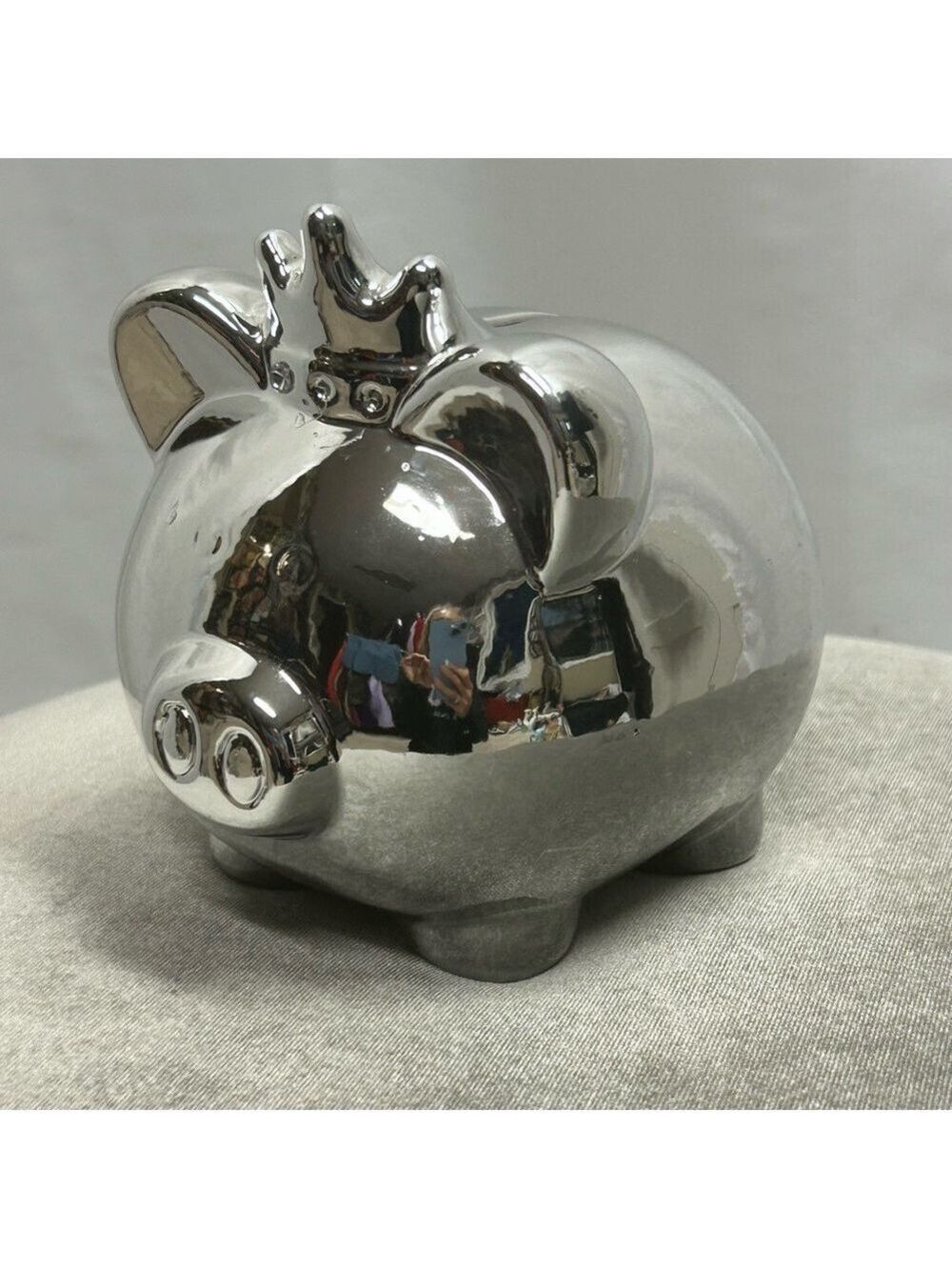 Silvertone piggy bank with crown